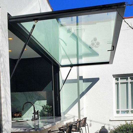 70 Gas Strut Window opened above a kitchen pass-through counter with side gas struts
