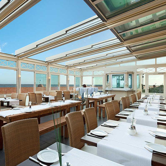 188 sunroom with an opening glazed roof above a dining area